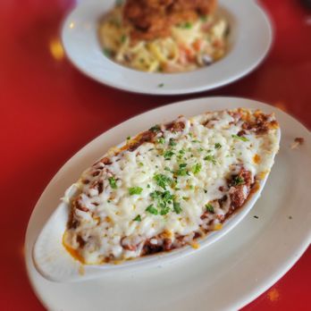 Tony and Luigi's Neighborhood Restaurant signature dishes Eggplant Parmigiana4 Cheese PenneSeafood Pasta
